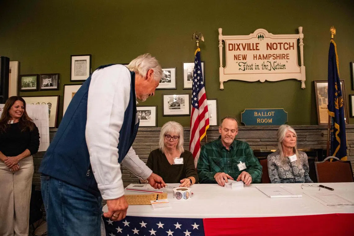 A resident of Dixville Notch, New Hampshire votes at midnight in one of America's weirder election traditions.