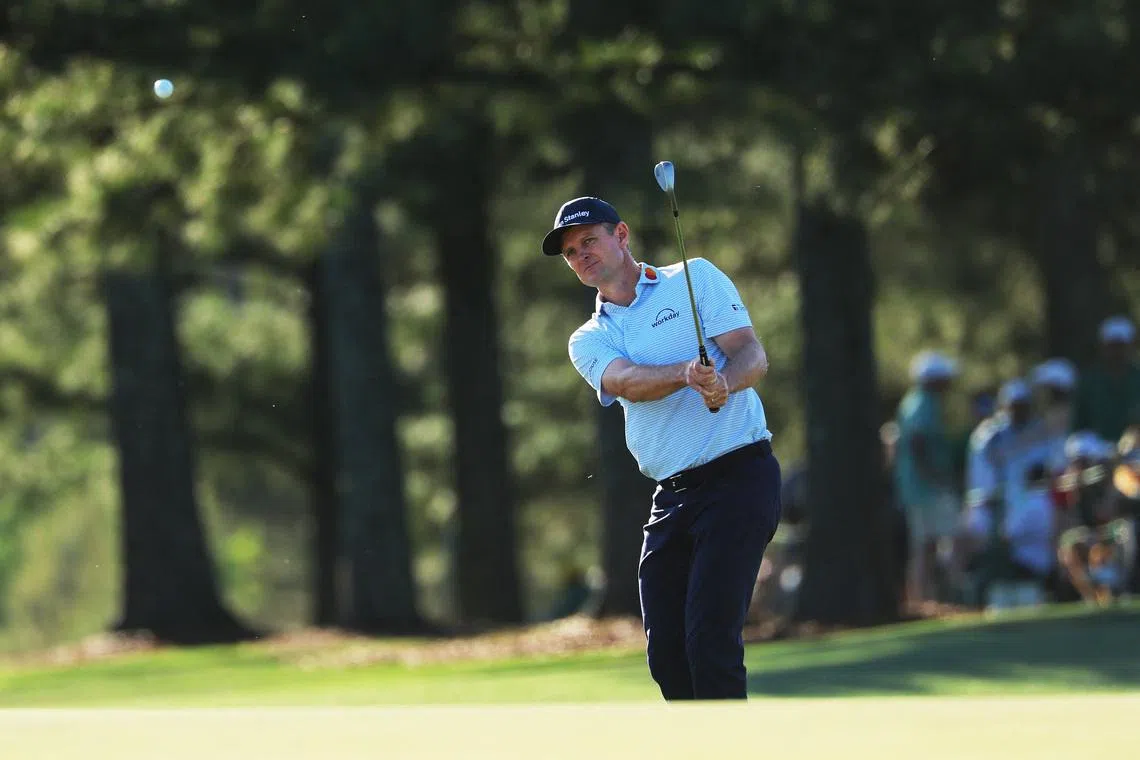 Golf - The Masters - Augusta National Golf Club, Augusta, Georgia, U.S. - April 9, 2026  England's Justin Rose chips onto the green of the 17th hole during the first round REUTERS/Mike Segar