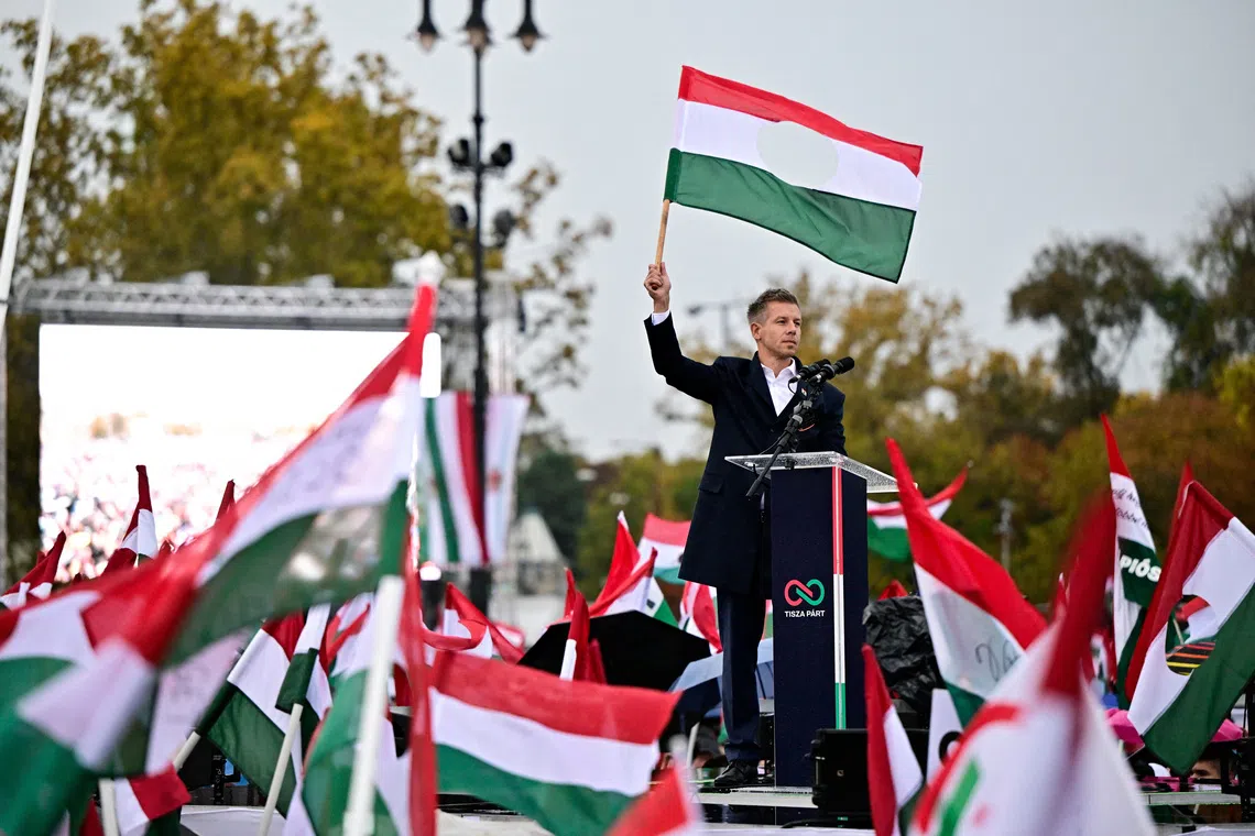 Hungary's Orban seeks to boost support, opposition holds rival rally on 1956 anniversary