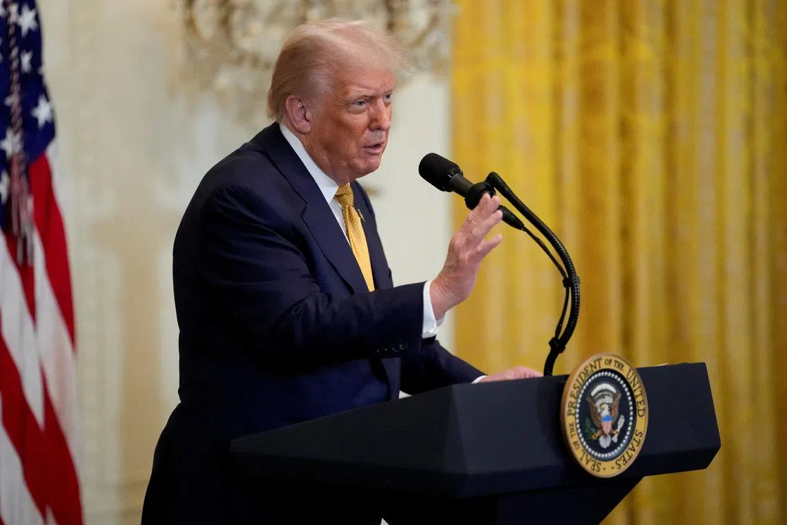 FILE PHOTO: U.S. President Donald Trump speaks as he hosts a dinner with Republican members of the U.S. Congress in the East Room of the White House in Washington, D.C., U.S., July 22, 2025. REUTERS/Kent Nishimura/File Photo