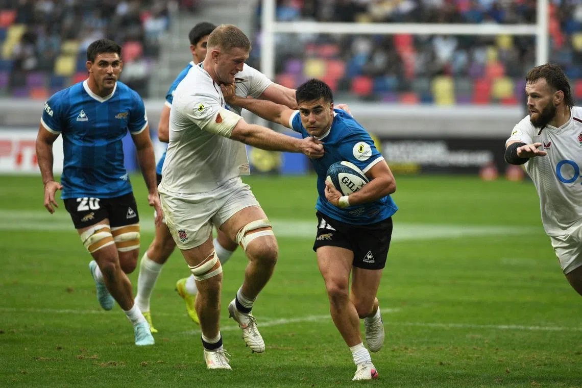 Rugby Union - Nations Championship - Argentina v England - Estadio Unico Madre de Ciudades, Santiago del Estero, Argentina - July 18, 2026 Argentina's Tomas Albornoz in action with England's Alex Coles REUTERS/Fernando Ariaz