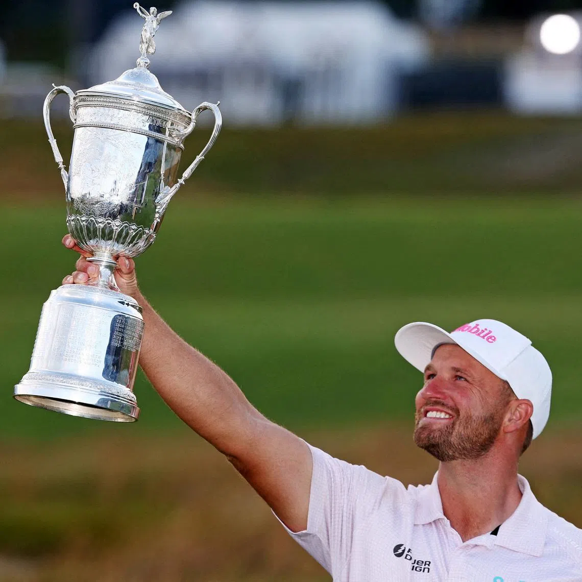 Wyndham Clark celebrating after winning the US Open golf tournament at Shinnecock Hills Golf Club in Southampton, New York, on June 21.