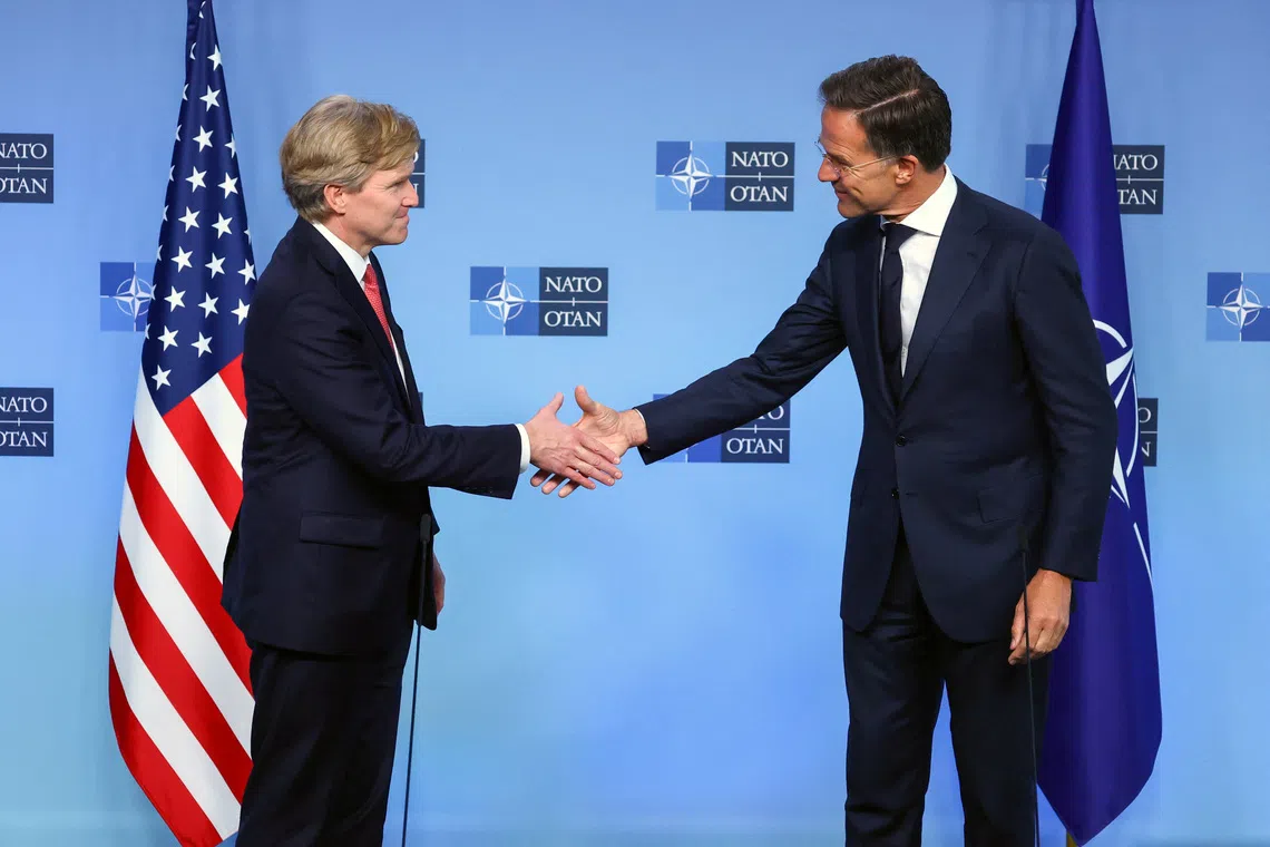 Pentagon policy chief Elbridge Colby shakes hands with NATO Secretary General Mark Rutte, at the Alliance's headquarters in Brussels, Belgium, August 27, 2026. REUTERS/Yves Herman
