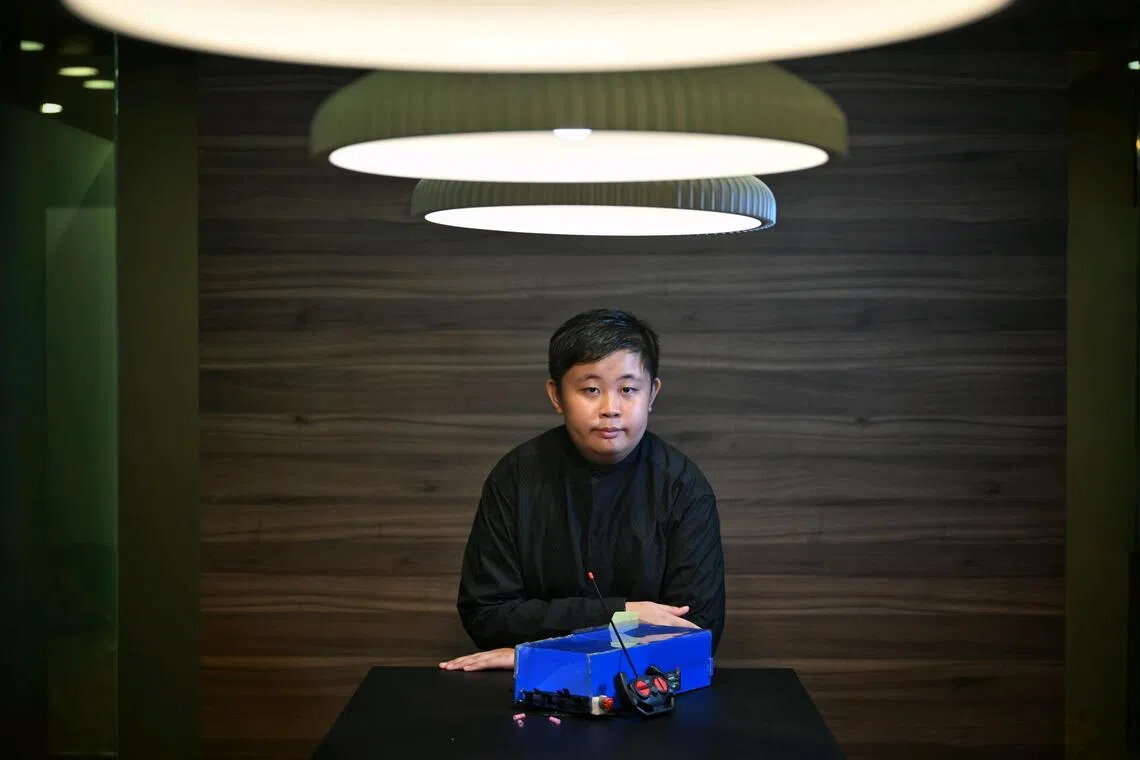 Boston Pek and some schoolmates from Westwood Primary School designed a robot vacuum cleaner using recycled and repurposed materials.