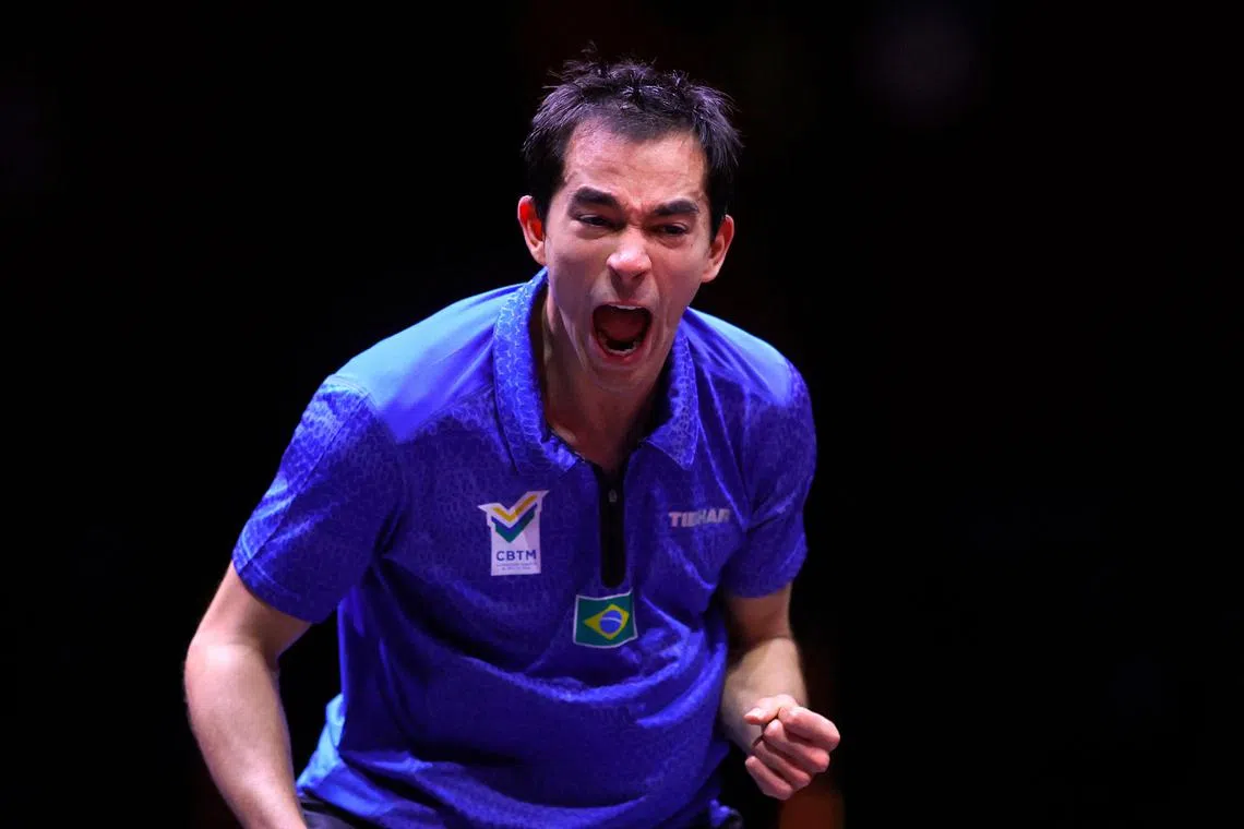 Brazil's Hugo Calderano reacts after a point in his loss to China's Wang Chuqin in the men's singles final at the World Table Tennis Championships in Doha on May 25, 2025.