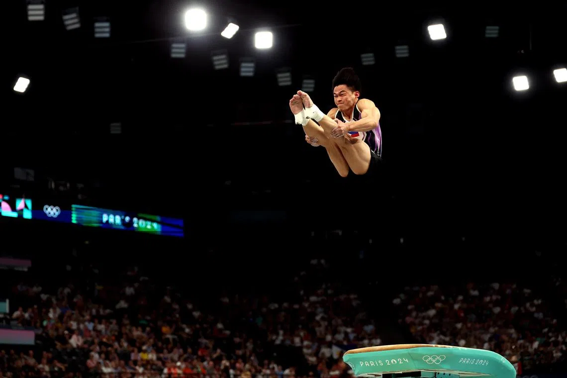epa11525301 Carlos Edriel Yulo of Philippines performs during the Men's Vault Final of the Artistic Gymnastics competitions in the Paris 2024 Olympic Games, at the Bercy Arena in Paris, France, 04 August 2024.  EPA-EFE/MOHAMMED BADRA