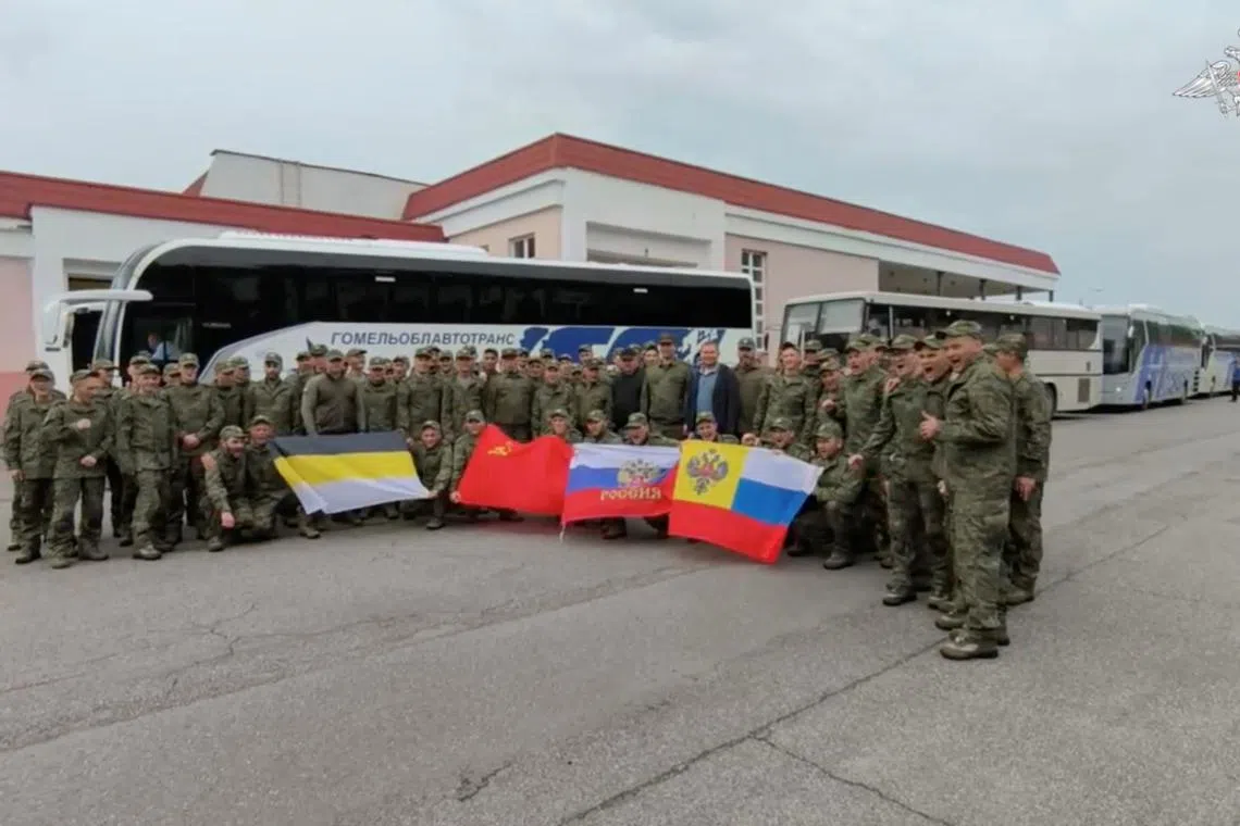 A still image from a video released by the Russian Defence Ministry shows what it said to be Russian service personnel captured by Ukrainian forces and released on the third day of the latest exchange of prisoners of war on May 25.