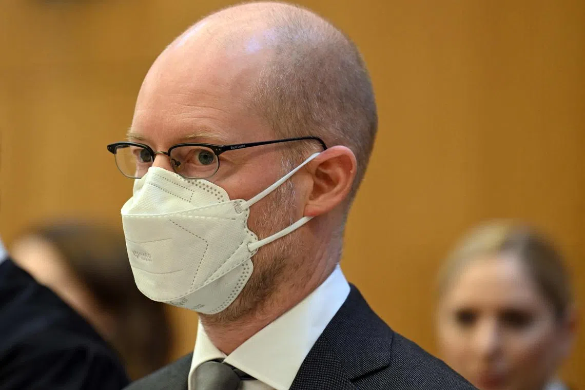 Former employee and co-defendant in the Wirecard trial, Oliver Bellenhaus waits in a courtroom at the District Court in Munich, southern Germany on December 19, 2022 for the start of another trial day on charges of commercial gang fraud, breach of trust, market manipulation and accounting manipulation.  