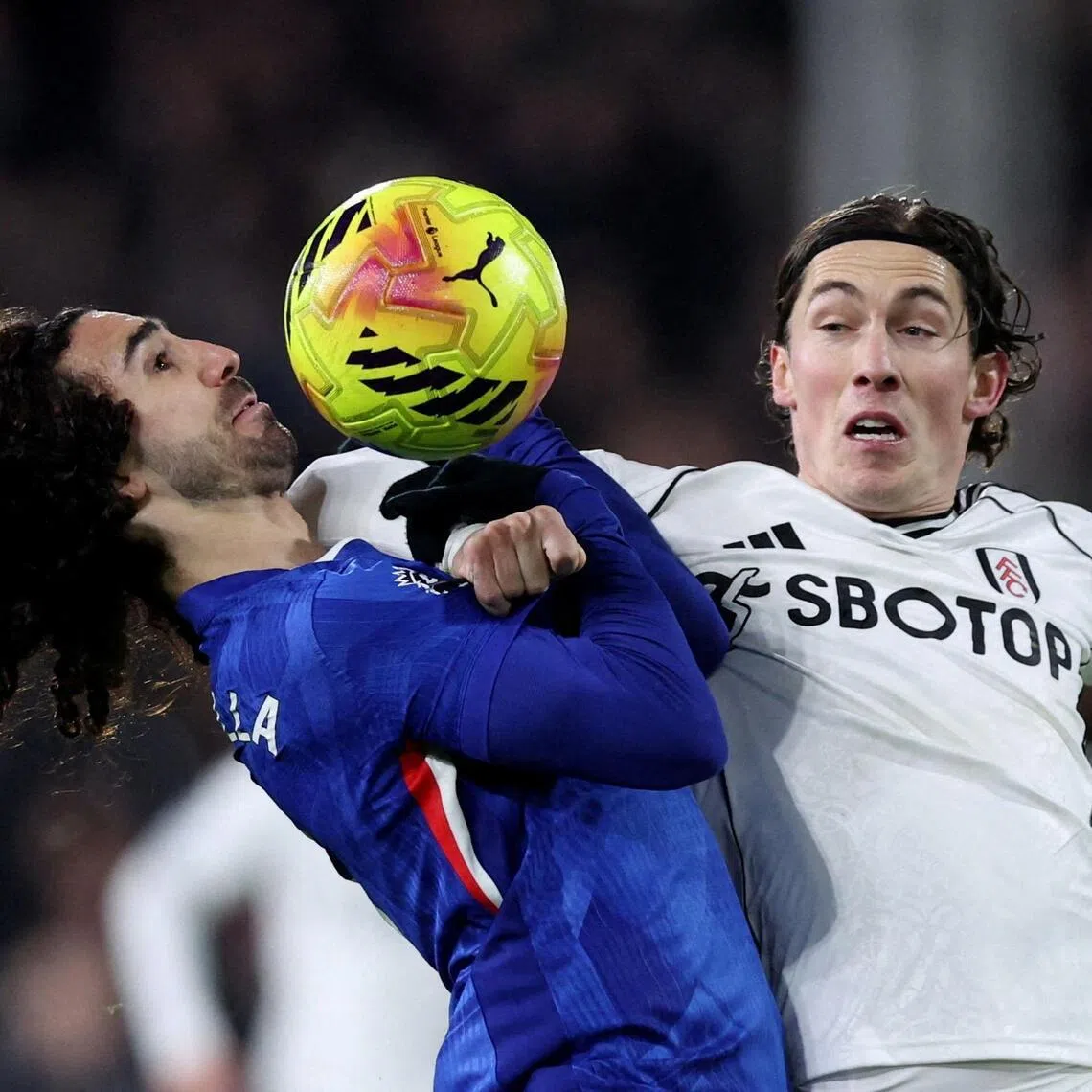 Chelsea's Marc Cucurella (left) fouls Fulham's Harry Wilson and is later sent off.