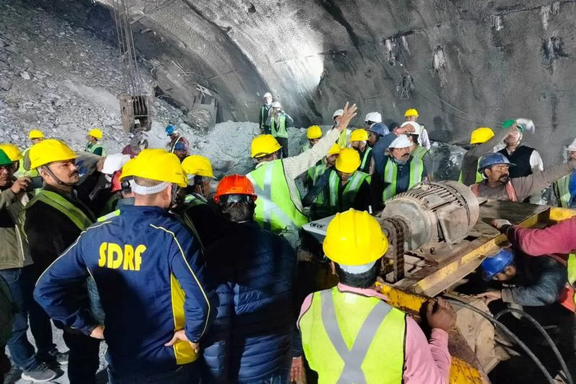 Members of rescue teams prepare to conduct a rescue operation after a portion of an under-construction tunnel collapsed in Uttarkashi in the northern state of Uttarakhand, India, November 14, 2023. Uttarakhand State Disaster Response Force/Handout via REUTERS