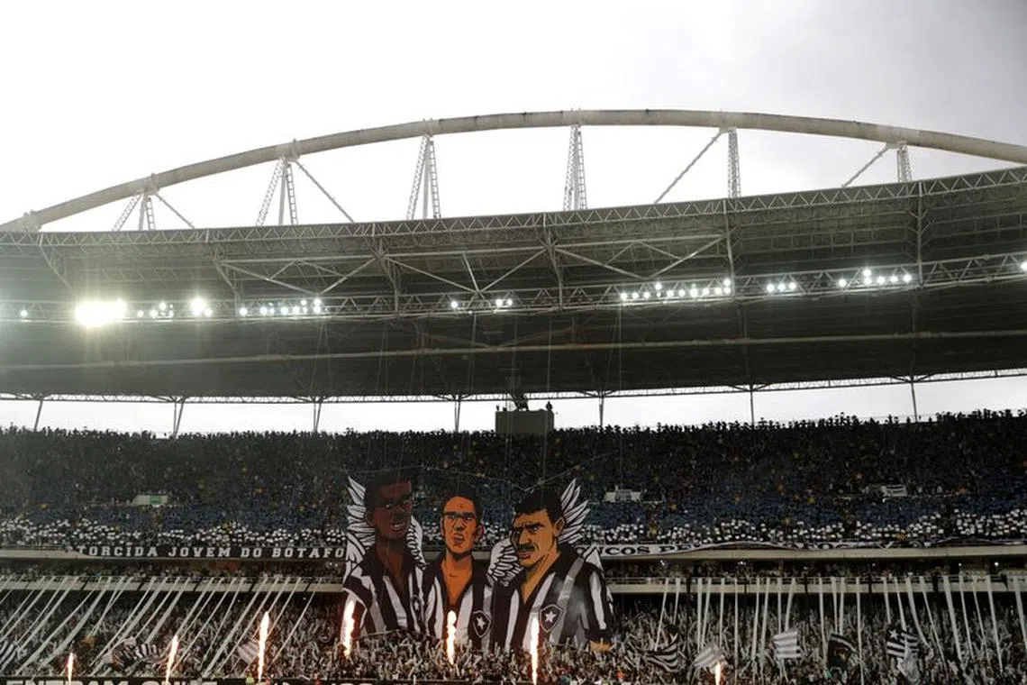 FILE PHOTO: Soccer Football - Brasileiro Championship - Botafogo v Bahia - Estadio Nilton Santos, Rio de Janeiro, Brazil - August 27, 2023 Botafogo fans inside the stadium during the match REUTERS/Ricardo Moraes/File Photo