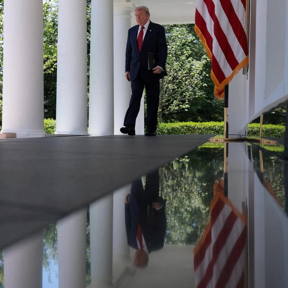 U.S. President Donald Trump attends a Mother’s Day reception for Gold Star mothers, whose children died while serving in the U.S. armed forces, and also to mothers the White House is describing as 'Angel Mothers’ who are the parents of people killed by immigrants in the U.S. illegally, in the Rose Garden at the White House in Washington, D.C., U.S., May 8, 2026. REUTERS/Jonathan Ernst     TPX IMAGES OF THE DAY     