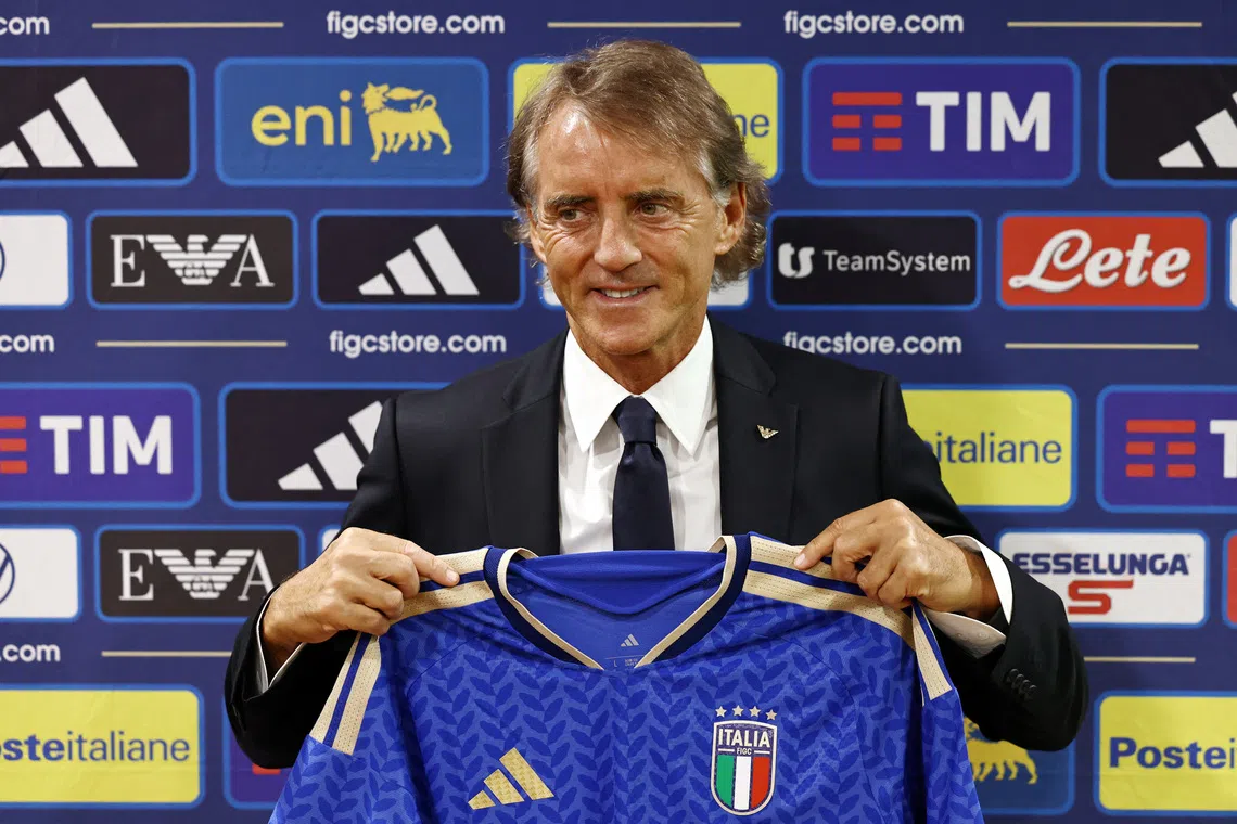 Soccer Football - Italy National Team - Roberto Mancini and Claudio Ranieri Press Conference - Rome, Italy - July 29, 2026 New Italy coach Roberto Mancini poses during the press conference REUTERS/Matteo Minnella