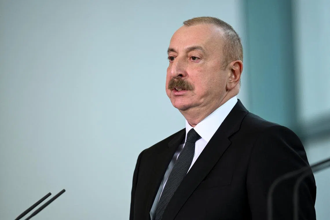 FILE PHOTO: President of Azerbaijan Ilham Aliyev speaks during a news conference with German Chancellor Olaf Scholz at the Chancellery in Berlin, Germany March 14, 2023. REUTERS/Annegret Hilse/File Photo
