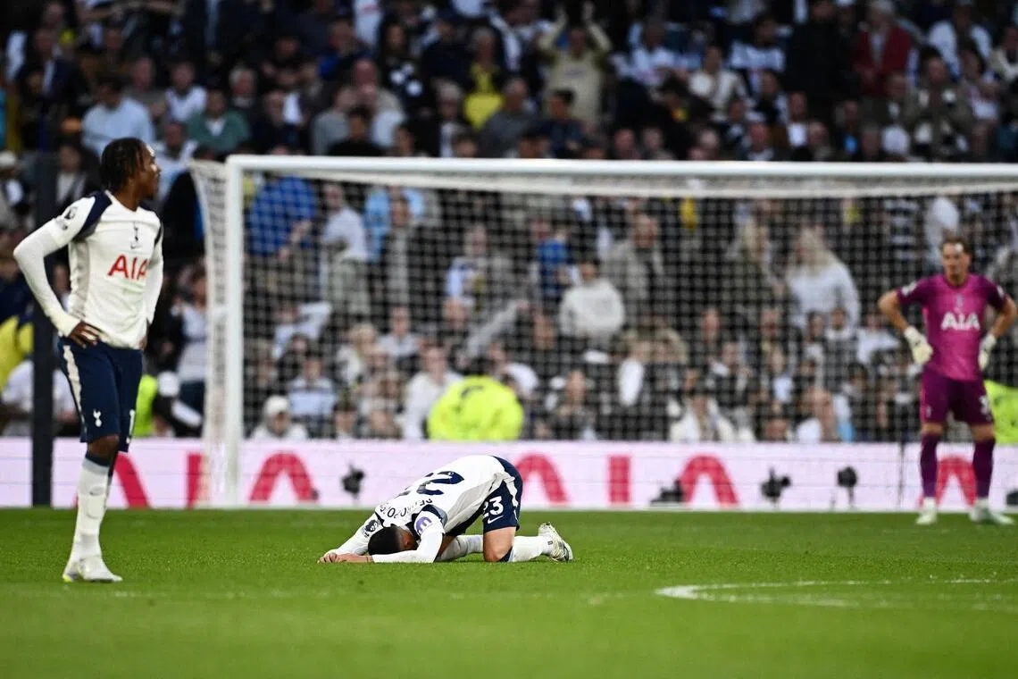 Tottenham Hotspur players looking dejected after an added-time equaliser sees Brighton & Hove Albion snatch a 2-2 English Premier League draw at the Tottenham Hotspur Stadium on April 18, 2026.