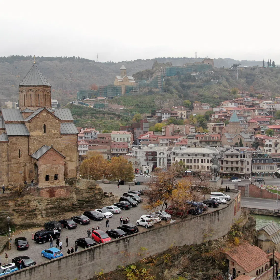 FILE PHOTO: A drone view of the city of Tbilisi, Georgia, November 15, 2025. REUTERS/Irakli Gedenidze/File Photo