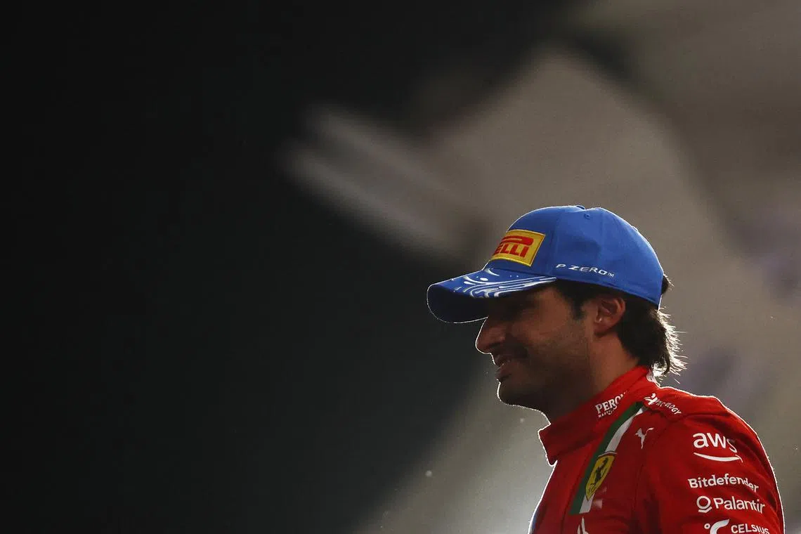 FILE PHOTO: Formula One F1 - Abu Dhabi Grand Prix - Yas Marina Circuit, Abu Dhabi, United Arab Emirates - December 8, 2024 Ferrari's Carlos Sainz Jr. celebrates after finishing second REUTERS/Jakub Porzycki/File Photo