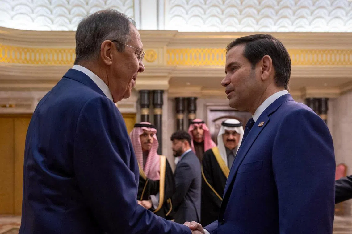 US Secretary of State Marco Rubio (right) shakes hands with Russian Foreign Minister Sergei Lavrov during their meeting in Riyadh, Saudi Arabia on Feb 18, 2025.