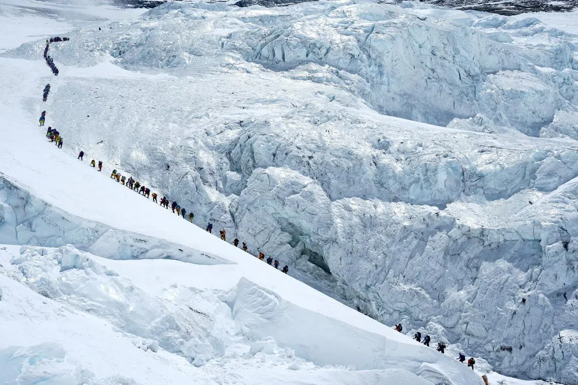 Experts warn overcrowding increases risks in Everest’s "death zone", prompting tighter controls.