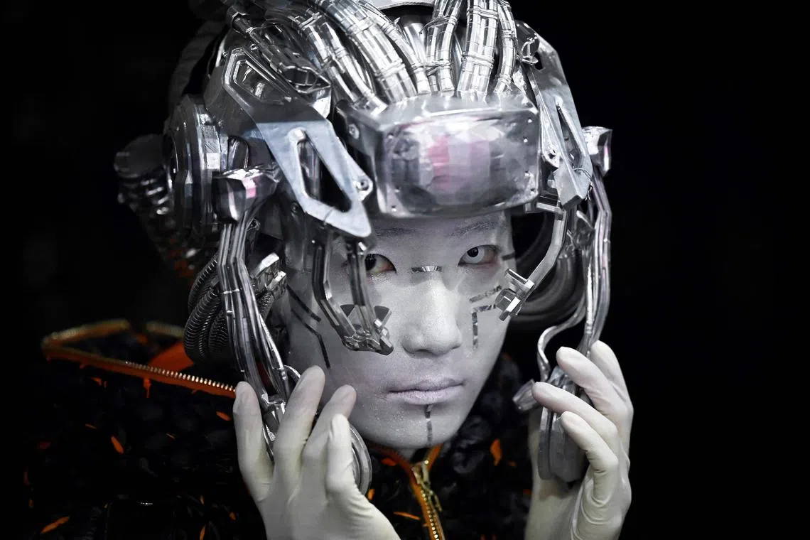 A model waiting backstage before presenting a creation from the D. Martina Queen by Ding Jie during the China Fashion Week in Beijing on March 26.