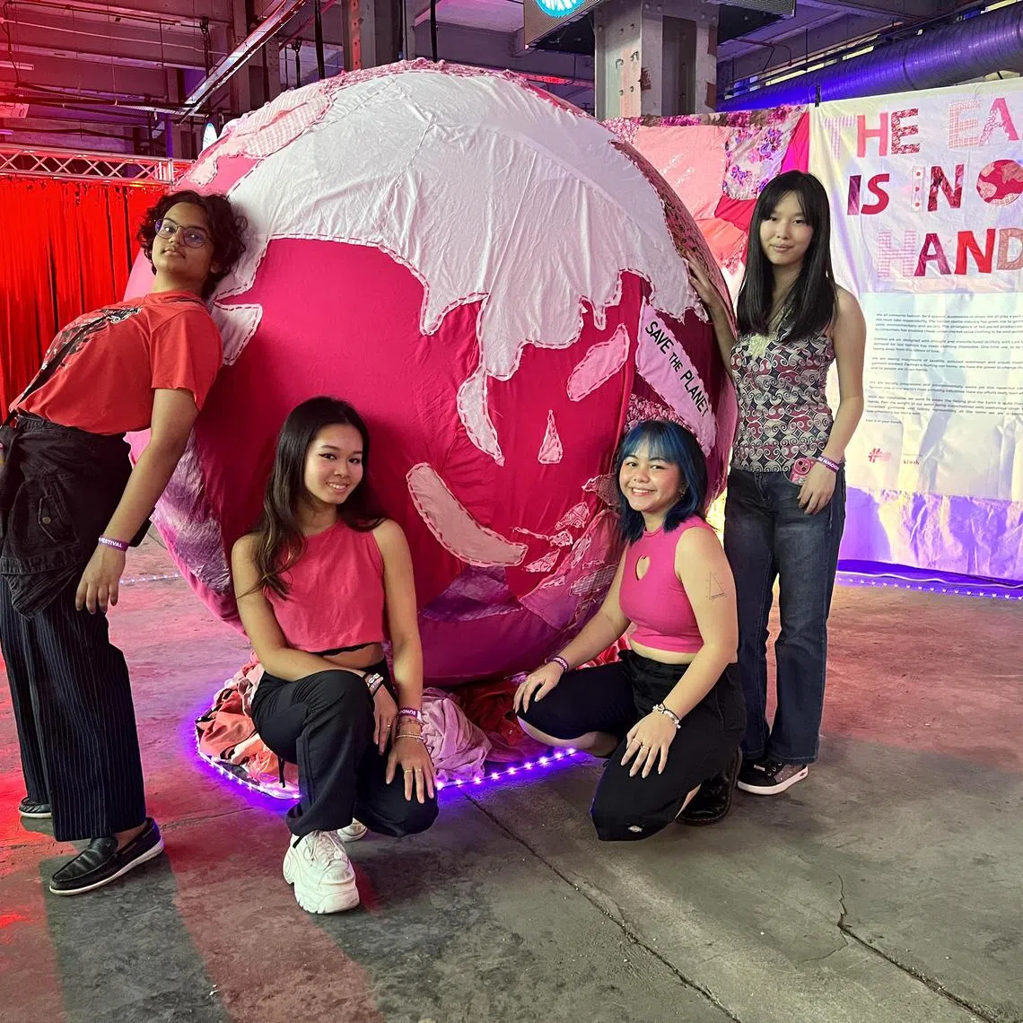 dlsustainable - Ms Lumin Hew (second from the left) founded Fashion Parade in 2021 to find more like-minded youths passionate about sustainable fashion.

Credit: Fashion Parade