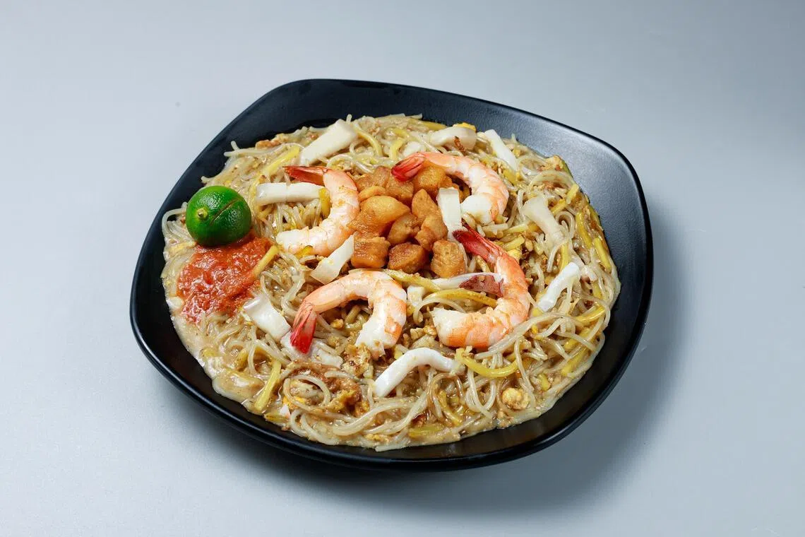 Mr Kelvin Teo, owner of The Neighbourwok which sells Hokkien mee. 
