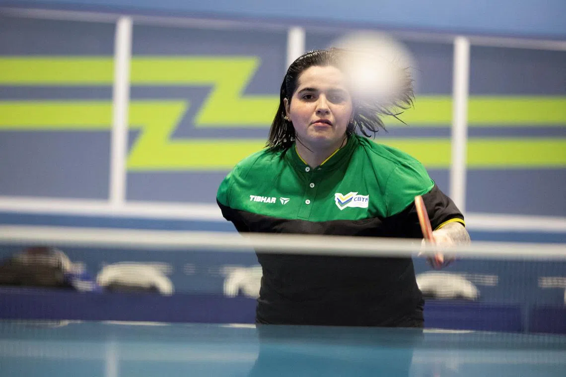 Table tennis athlete Bruna Alexandre, who will be the first Brazilian to compete in the Olympics and Paralympics Games in Paris, attends a practice session in Sao Paulo, Brazil June 7, 2024. REUTERS/Jorge Silva