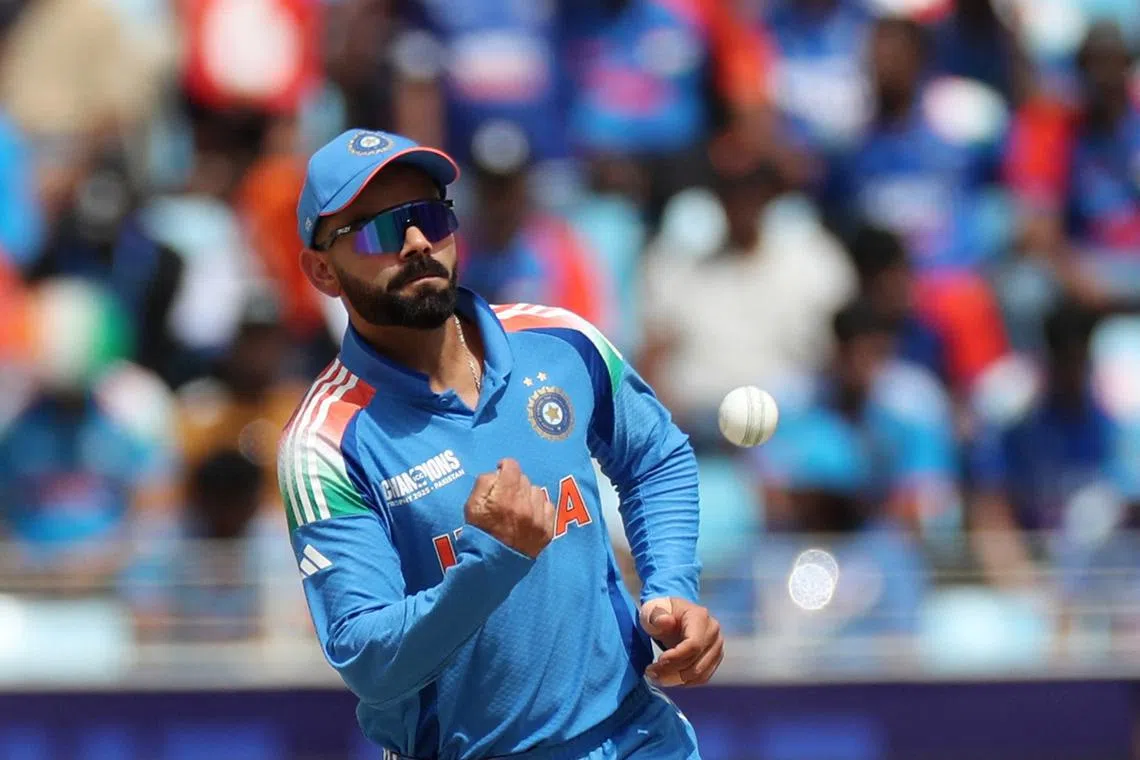 Cricket - ICC Men's Champions Trophy - Final - India v New Zealand - Dubai International Stadium, Dubai, United Arab Emirates - March 9, 2025 India's Virat Kohli in action fielding REUTERS/Satish Kumar/File Photo