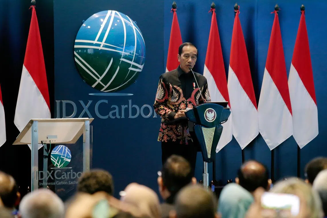 epa10883271 Indonesian President Joko Widodo gives an address during the opening ceremony of Indonesia Carbon Exchange in Jakarta, Indonesia, 26 September 2023. President Widodo inaugurated the Indonesian Carbon Exchange held by Indonesia Stock Exchange, marking a historic point for Indonesia in overcoming climate change.  EPA-EFE/ADI WEDA