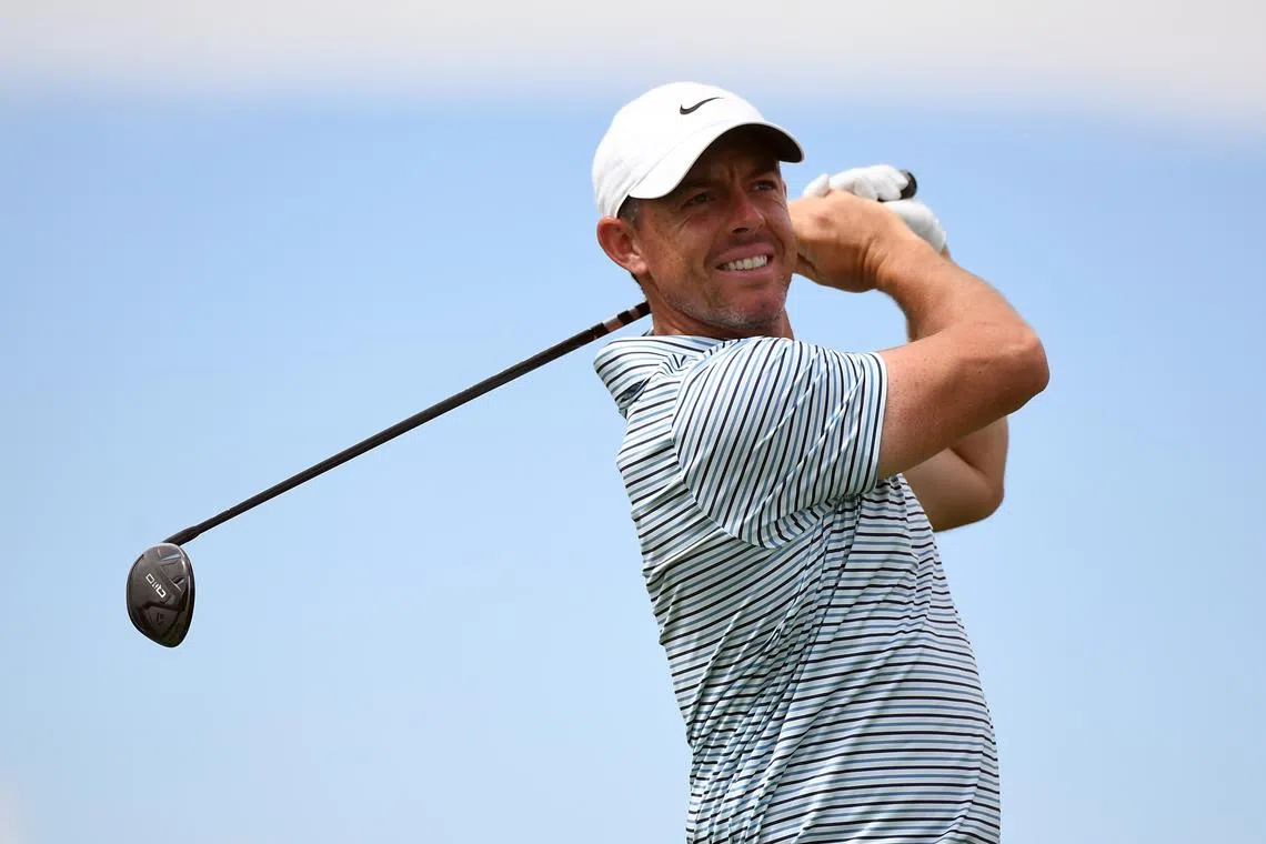 FILE PHOTO: Aug 25, 2024; Castle Rock, Colorado, USA; Rory McIlroy hits his tee shot on the sixth hole during the final round of the BMW Championship golf tournament at Castle Pines Golf Club. Mandatory Credit: Christopher Hanewinckel-USA TODAY Sports/File Photo