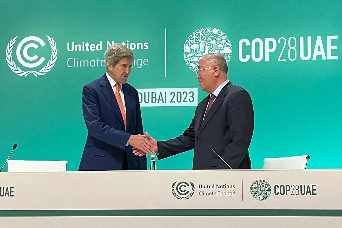 US climate envoy John Kerry (left) and his Chinese counterpart Xie Zhenhua, who have known each other for years, credited their cooperation with helping bring a successful outcome to the Dubai summit, which led to a call to transition away form fossil fuels. 