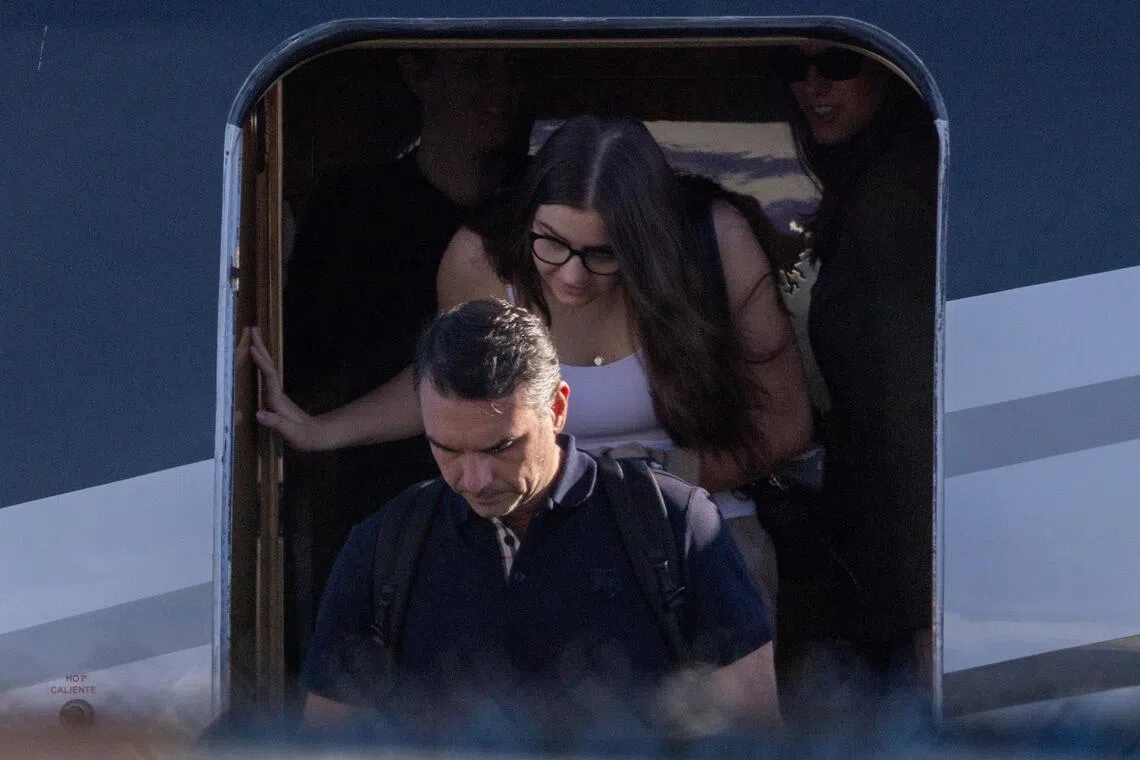 Brazilian senator Flavio Bolsonaro disembarks from a plane after arriving at Opa-locka Executive Airport near Miami, Florida on Oct 28.