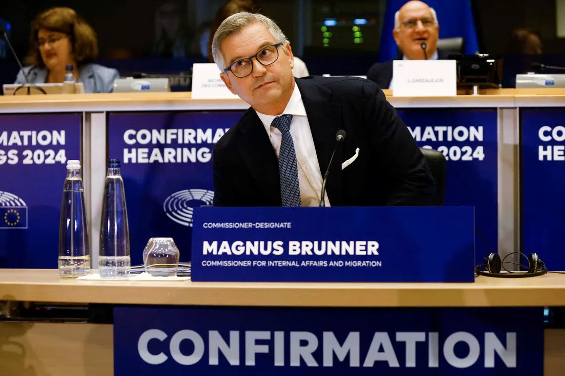 Magnus Brunner, the nominee to become the European Union's commissioner for Internal Affairs and Migration, faces a confirmation hearing before a European Parliament committee, in Brussels, Belgium November 5, 2024. REUTERS/Johanna Geron/File Photo