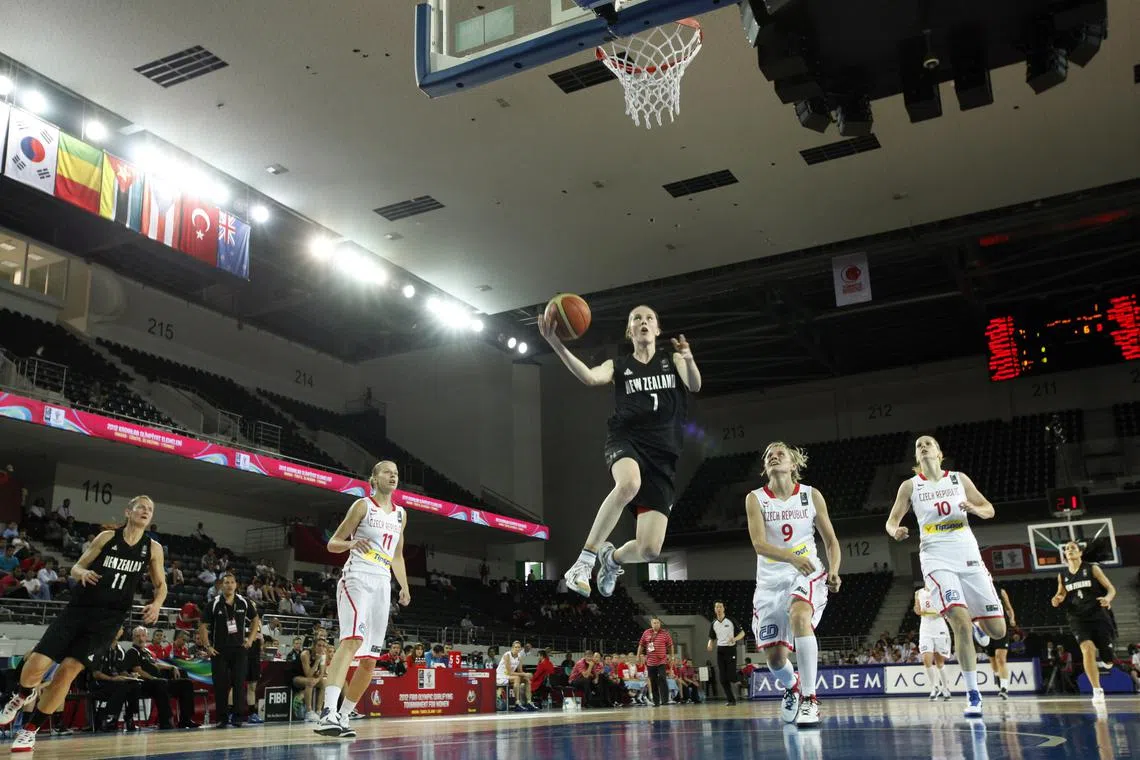 FILE PHOTO: New Zealand's Antonia Edmondson goes for a basket against Czech Republic during their 2012 women's FIBA Olympic Qualifying Tournament in Ankara June 25, 2012.  REUTERS/Umit Bektas/File Photo