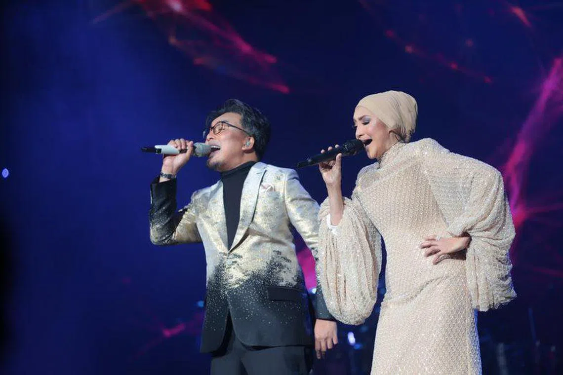 Malaysian singers Anuar Zain and Ziana Zain in concert.