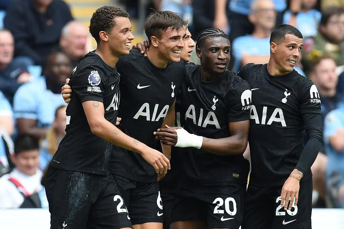 Soccer Football - Premier League - Manchester City v Tottenham Hotspur - Etihad Stadium, Manchester, Britain - August 23, 2025  Tottenham Hotspur's Joao Palhinha celebrates scoring their second goal with teammates REUTERS/Peter Powell