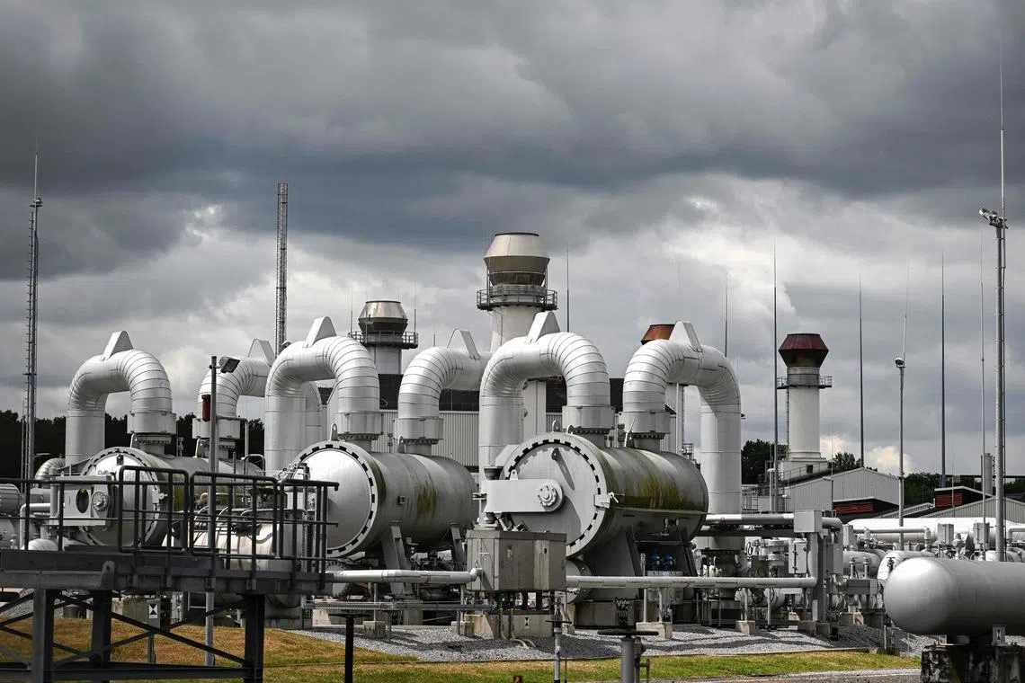 In this file photo taken on July 15, 2022, pipes and pressure gauges for gas lines are pictured at Open Grid Europe (OGE), one of Europe's largest gas transmission system operators, in Werne, western Germany. 