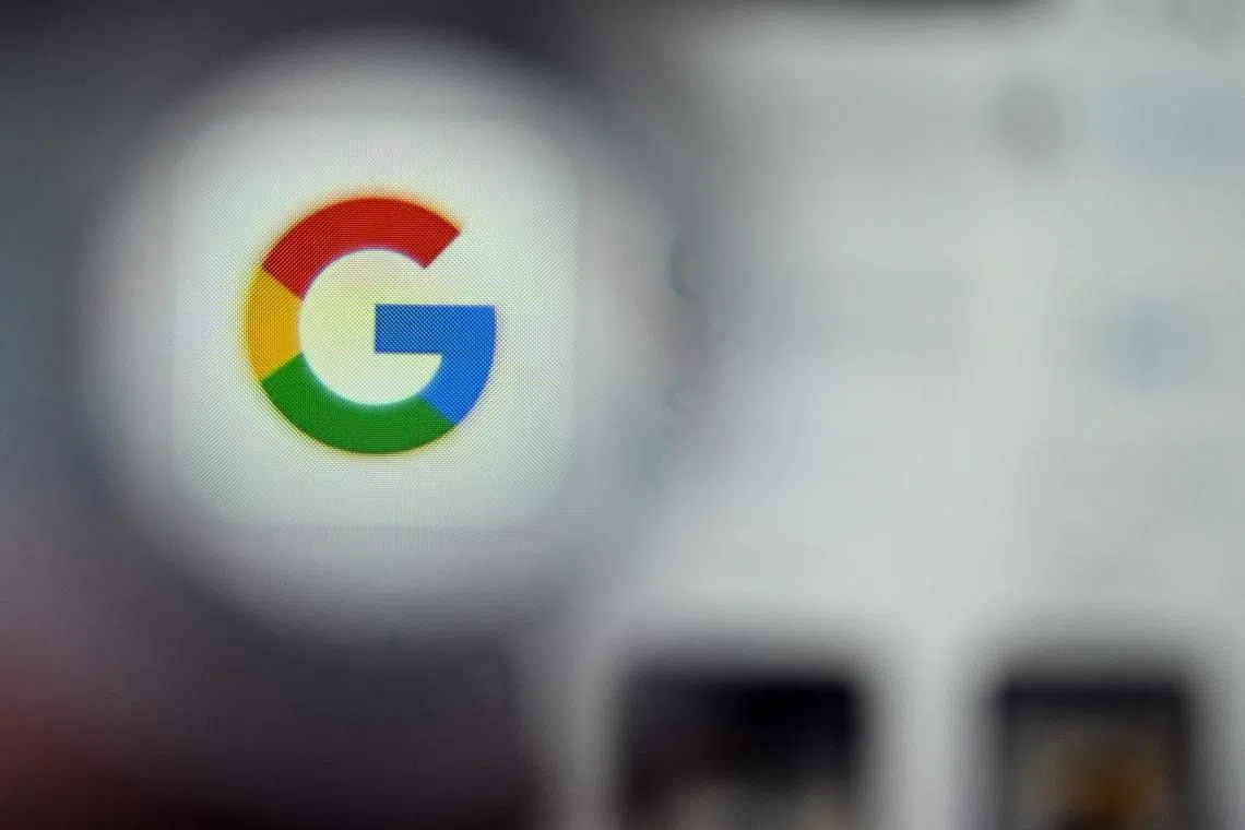 (FILES) This illustration photograph taken on December 22, 2023, shows the logo of US multinational technology and Internet-related services company Google displayed on a smartphone's screen, in Frankfurt am Main, western Germany. Google on February 8, 2024 rebranded its ChatGPT-style chatbot to Gemini, giving it unprecedented prominence on its products, as the tech titan's AI race with Microsoft heats up. (Photo by Kirill KUDRYAVTSEV / AFP)