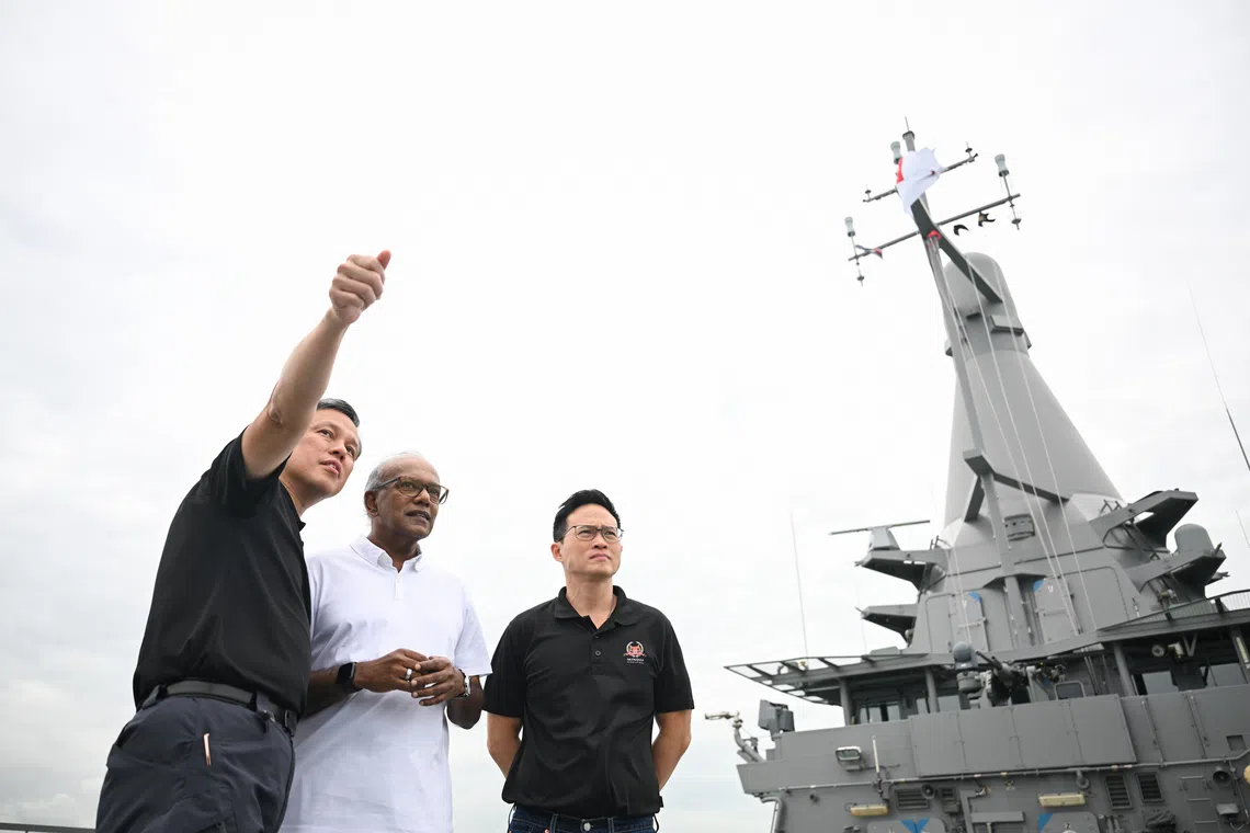 Coordinating Minister for National Security and Minister for Home Affairs Mr K. Shanmugam (centre) with Minister for Defence Mr Chan Chun Sing (left) and Minister of State for Defence Mr Desmond Choo at Exercise Highcrest on Nov 28.