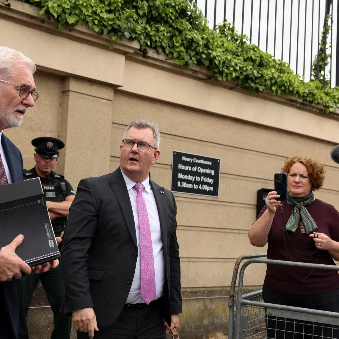 Jeffrey Donaldson, former leader of the Democratic Unionist Party (DUP), charged with historical sex offences, leaves the Newry Courthouse as he appeared for trial, in Newry, Northern Ireland, June 17, 2026. REUTERS/Cathal McNaughton