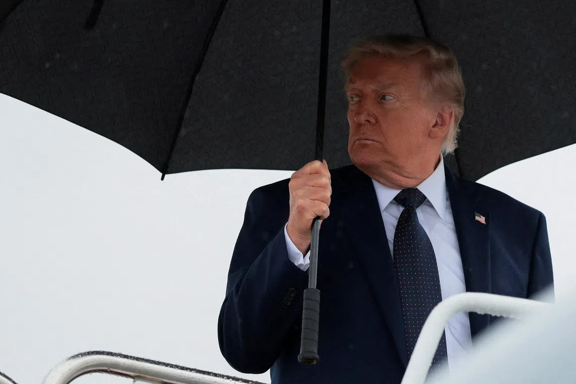U.S. President Donald Trump looks on as he boards Air Force One en route to Morristown Airport in Morristown, New Jersey, at Joint Base Andrews, Maryland, U.S., May 22, 2026. REUTERS/Kylie Cooper