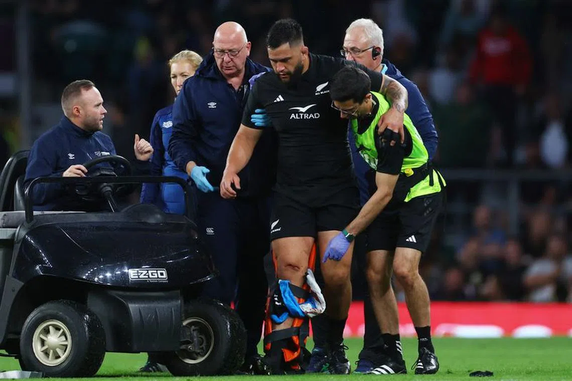 Rugby Union - New Zealand v South Africa - World Cup warm-up - Twickenham Stadium, London, Britain - August 25, 2023 New Zealand's Tyrel Lomax is helped onto a cart after sustaining an injury Action Images via Reuters/Matthew Childs/File Photo