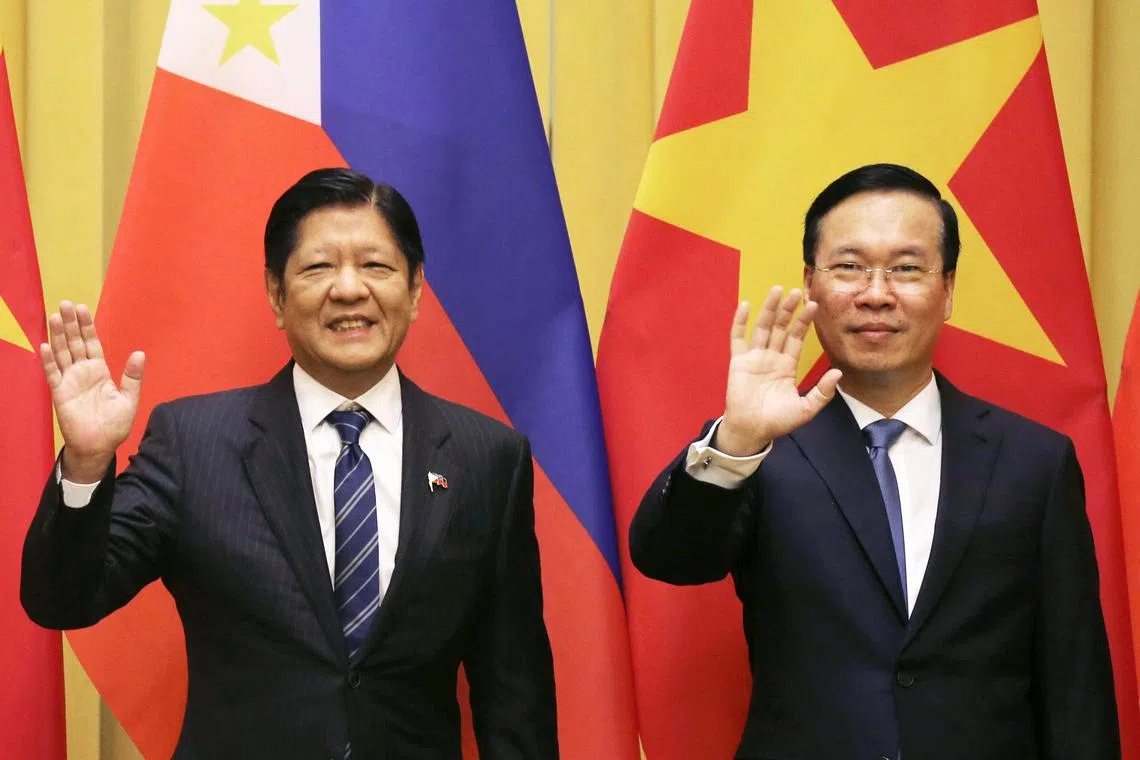 Vietnamese President Vo Van Thuong (right) and his Filipino counterpart Ferdinand Marcos Jr pose for a photo before a meeting at the presidential palace in Hanoi on Jan 30. 
