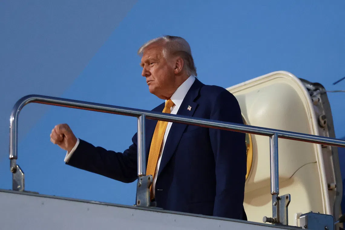 US President Donald Trump disembarking Air Force One at Haneda Airport in Tokyo for the second stop on his Asia tour.