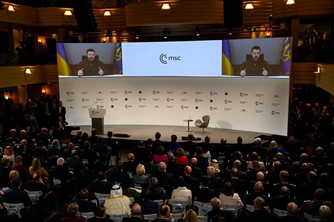 Ukrainian President Volodymyr Zelensky addressing delegates at the Munich Security Conference via video in Munich, southern Germany, on Feb 17, 2023. 