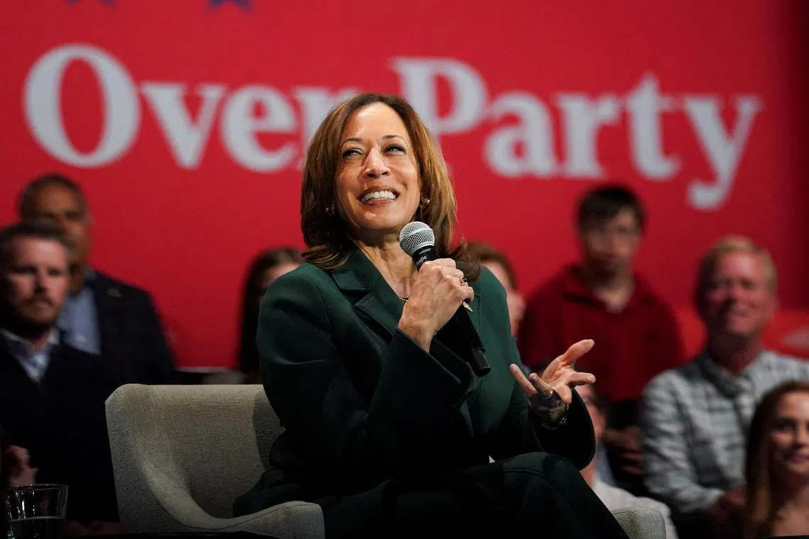 Democratic presidential nominee U.S. Vice President Kamala Harris attends a conversation moderated by Charlie Sykes with former U.S. Rep. Liz Cheney (R-WY) in Brookfield, Wisconsin, U.S., October 21, 2024. REUTERS/Kevin Lamarque