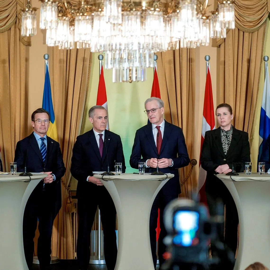 Icelandic Prime Minister Kristrun Frostadottir, Swedish Prime Minister Ulf Kristersson, Canadian Prime Minister Mark Carney, Norwegian Prime Minister Jonas Gahr Stoere, Danish Prime Minister Mette Frederiksen and Finnish Prime Minister Petteri Orpo gather at the government's representative building in Oslo, Norway, March 15, 2026. NTB/Thomas Fure via REUTERS