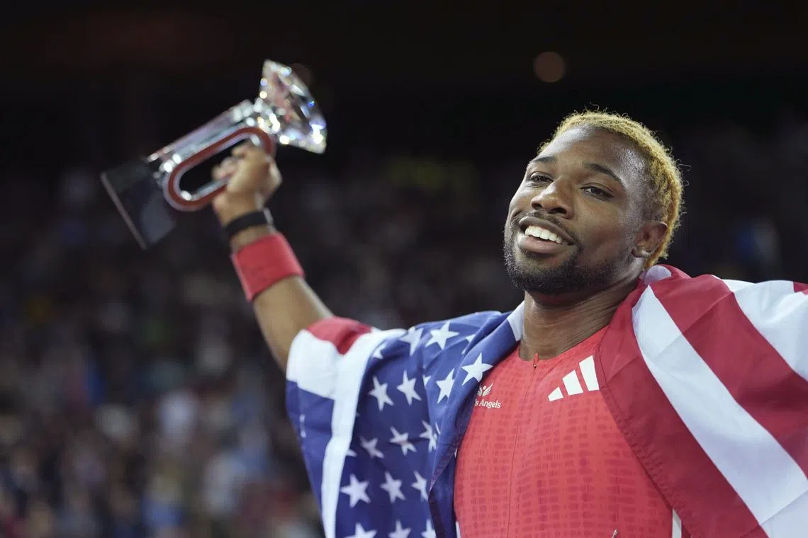Noah Lyles of United States celebrates after winning the 200m at the Diamond League meet in Zurich.