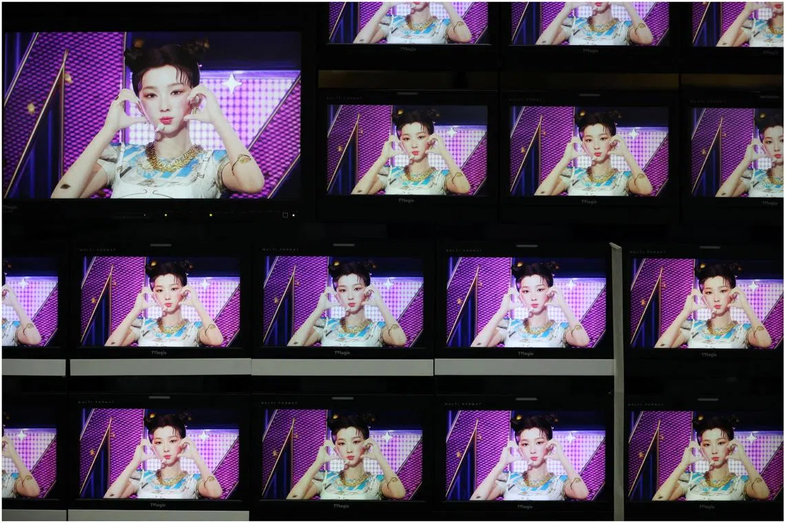 Footages of virtual girl group MAVE is played at the control room of MBC in Seoul on Feb 28, 2023.
