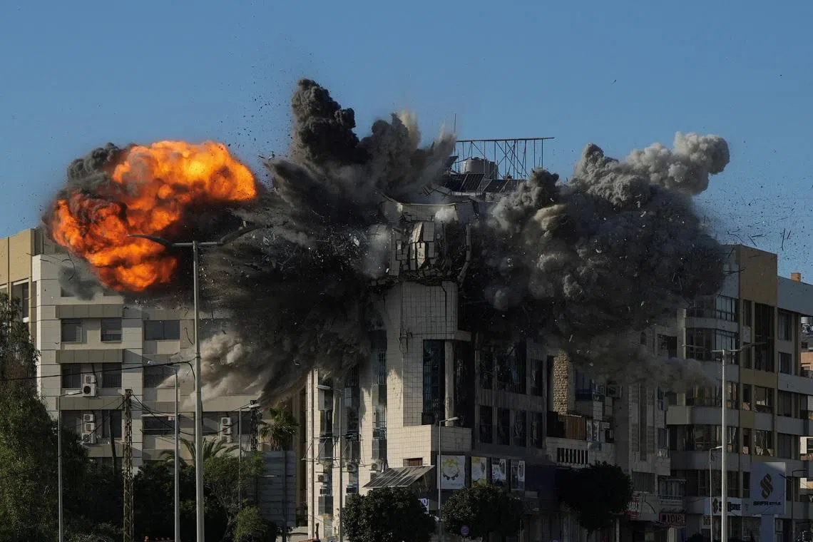 An explosion takes place in a building following an Israeli strike, amid escalating hostilities between Israel and Hezbollah, as the U.S.-Israel conflict with Iran continues, in Beirut, Lebanon, March 31, 2026. REUTERS/Mohammad Yassine